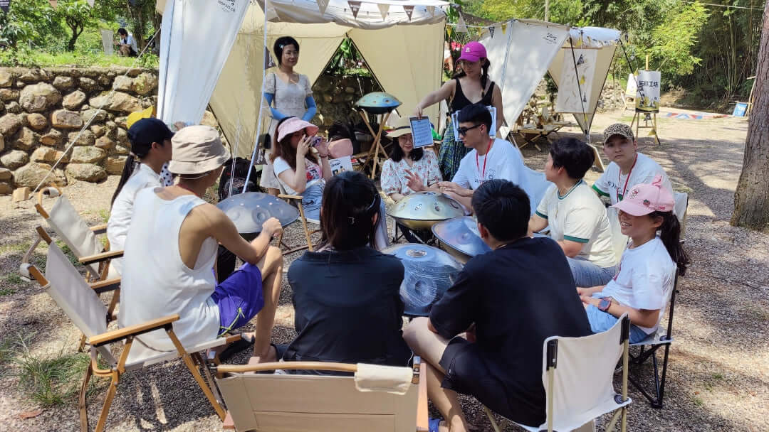 Playing handpan at camping activities